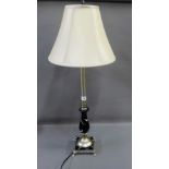 A contemporary black and silver giltwood table lamp base, 81cm high overall