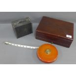 Mixed lot to include a mahogany workbox, a vintage Brownie camera and a Rabone tape measure, (3)