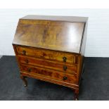 Mahogany bureau, the fall front with a fitted interior over pull out slides and three graduating