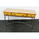 Ducal pine and iron hall table, the rectangular top with rounded edges over two frieze drawers, 80 x