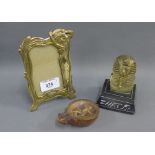 Brass Art Nouveau style photo frame, a model of a Pharaoh's head and a reproduction Roman lamp, (3)