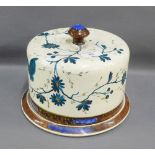Late 19th early 20th century pottery cheese bell and cover painted with butterfly, flowers and