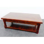 Contemporary stained hardwood coffee table, with a slatted undertier 135 x 75cm