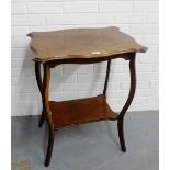 Early 20th century mahogany serpentine two tier side table, 76 x 62cm