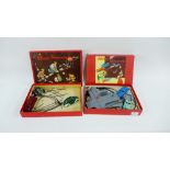 Schuco Varianto 3010 & 3010K boxed sets containing clockwork cars etc (2)