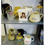 Two shelves of whisky water jugs etc., (11)