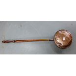 Copper bed pan with turned wooden handle, 104cm