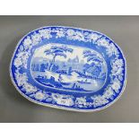 Staffordshire blue and white ashet with floral border and row boats on the river, 40cm long
