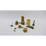 A collection of miniature brass items to include a Miners safety lamp, diver's helmet, deck chair