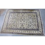 Eastern rug, the beige field with allover foliate pattern, 339 x 248cm