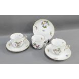 Herend porcelain set of three tea cups and four saucers, 20th century, hand painted with birds and