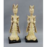 Pair of Tang style pottery female figures on ebonised square bases, height overall 38cm, (2)
