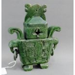 Spinach green jade censor and cover, carved with flowers and foliage and with ring handles to