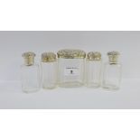 Edwardian set of five silver topped glass bottles, London 1903, tallest 9.5cm (5)