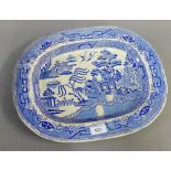 Staffordshire 'Willow' patterned blue and white ashet, 41 x 32cm