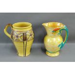 Two large 1930's Charlotte Rhead style jugs, to include one with a moulded Dragon handle and another