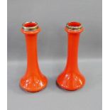 Pair of red art glass vases with white metal rims, 20cm high, (2)