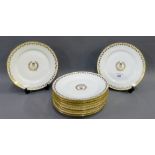 Set of ten Sevres white glazed porcelain plates with gilt edge rims and ivy leaf border with