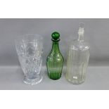 Large clear glass Poison bottle and stopper, an Art Deco style green glass decanter and stopper