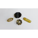 A group of four hardstone brooches (4)
