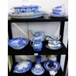 Quantity of blue and white pottery to include Mason's and Copeland etc., contained over three