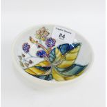 Moorcroft leaf and berry patterned circular dish with impressed backstamps, 12cm
