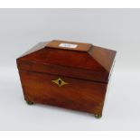 19th century mahogany sarcophagus shaped tea caddy on four bun feet, 20cm long