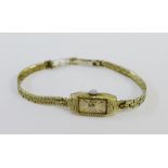 Lady's vintage 9 carat white gold Rotary wristwatch on textured bracelet strap