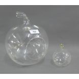 Two clear glass apple shaped storage jars, (2)