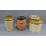 Two stoneware crocks and a terracotta potato jar and cover, (3)