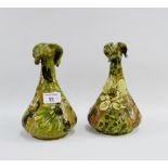 Pair of art pottery floral patterned vases, 21cm high, (2)