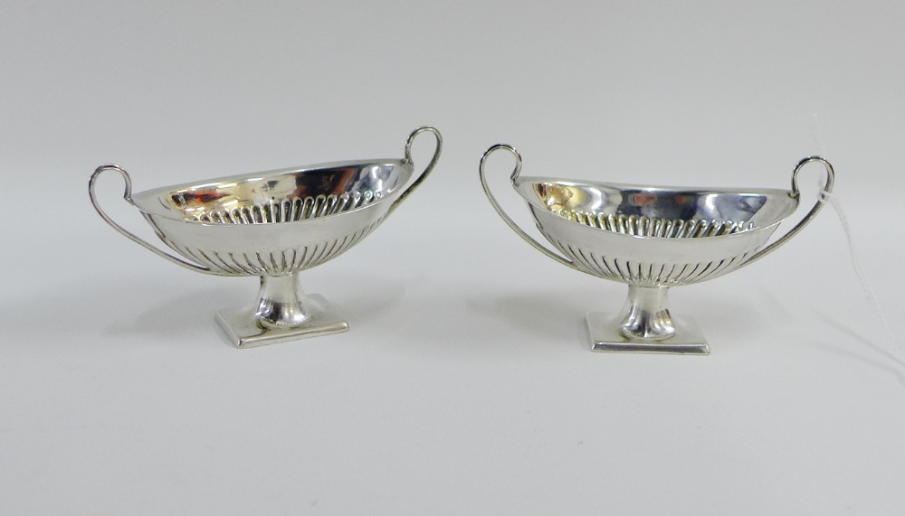 A pair of Victorian Adam style silver salts by Henry Atkin, Sheffield 1894, 10cm wide (2)