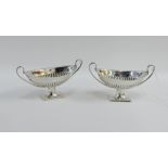 A pair of Victorian Adam style silver salts by Henry Atkin, Sheffield 1894, 10cm wide (2)