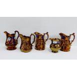 Five copper lustre jugs, (5)
