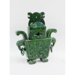 Spinach green jade censor and cover, carved with flowers and foliage and with ring handles to