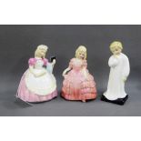 Three Royal Doulton china figures to include 'Cookie' HN2218, 'Rose' HN1368 and 'Darling' HN1985, (