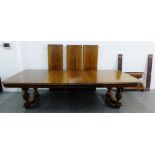 Late 19th / early 20th century walnut extending dining table, with gadrooned edge and deep carved