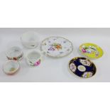 A collection of Meissen porcelains to include a cup, two saucers, and box bases, etc (7)