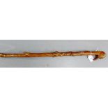 Japanese Gentleman's walking cane, the handle as mans head, with further carving in relief to