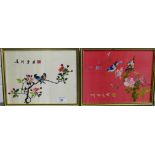 Two Japanese embroidered panels depicting birds and blossom, in glazed frames, largest 27 x 20cm, (