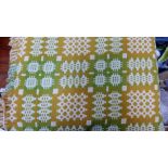 Woollen green and yellow bed throw