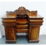 19th century mahogany sideboard, with scrolling shell carved ledgeback over two central drawers