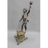 Bronze patinated metal figural candlestick, 44cm high (a/f)