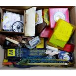 Carton containing a quantity of fishing flies and reels etc., (a large lot)