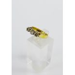 18 carat gold three stone diamond ring, stamped 750 UK ring size N
