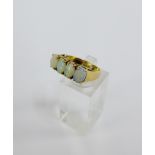 9 carat gold opal four stone claw set dress ring, London 1975, UK ring size M