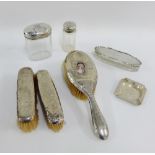 Mixed lot to include three various silver topped glass jars and bottles, three silver backed brushes