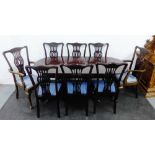 Mahogany extending dining table and set of eight chairs with pierced splat backs and upholstered