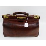 Vintage brown leather and brass mounted Gladstone bag