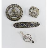 Celtic Art Industries silver brooch, Iona silver brooch, and two other silver brooches (4)